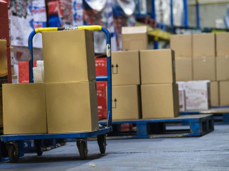 Nutting Tugger Carts used in manufacturing and distribution warehouses