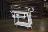 26 x 40 steel shelf ladder cart with 800 lb capacity and integrated spring-loaded 3-step ladder