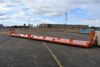 deck saddles positioning data center frame on heavy-duty transport cart